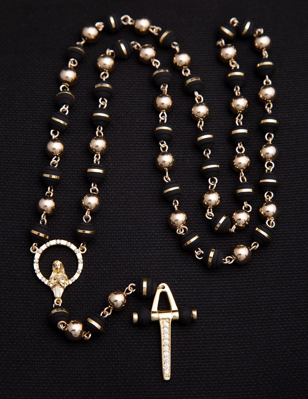 Camándulas balín liso 6mm y neopreno argollado 6mm, Crucero virgen cristal y cruz péndulo